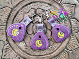 celestial planchette snap tab keychain